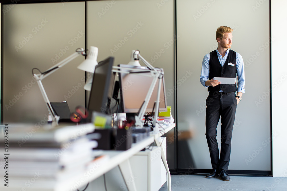 Fototapeta premium Young man with tablet