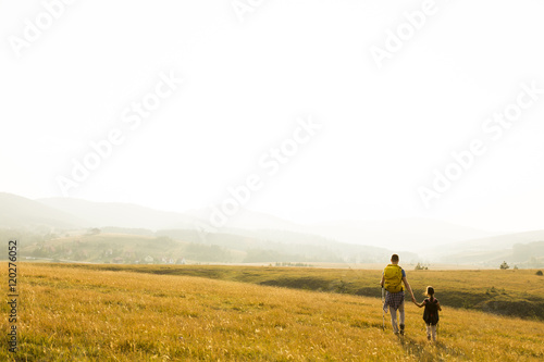 Father and daughter hiking