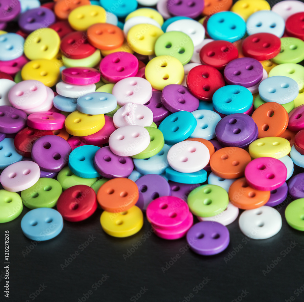 Mixed coloured bright buttons background Mixed coloured bright buttons background