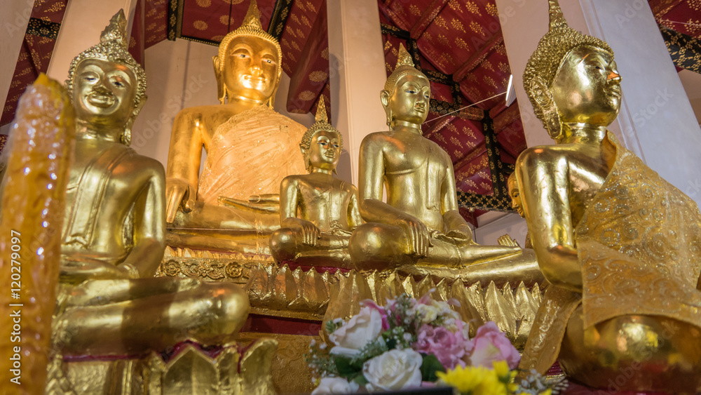 Buddha gold statue and thai art architecture in Wat Arun buddhist temple in Bangkok, Thailand.Selective focus. Buddha gold statue and thai art architecture in Wat Arun buddhist temple in Bangkok, Thailand.Selective focus.