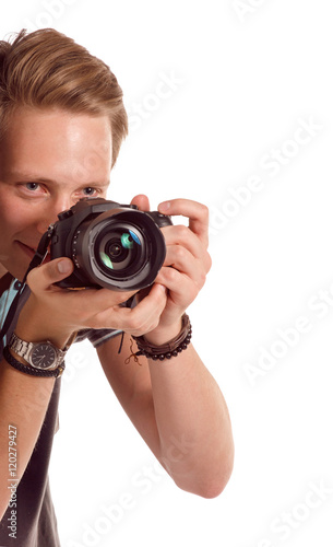 Closeup portrait of a young man taking a picture from corner