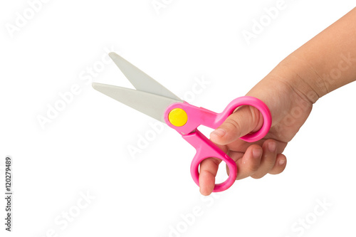 kid scissors / child holding kid scissors isolated with clipping path