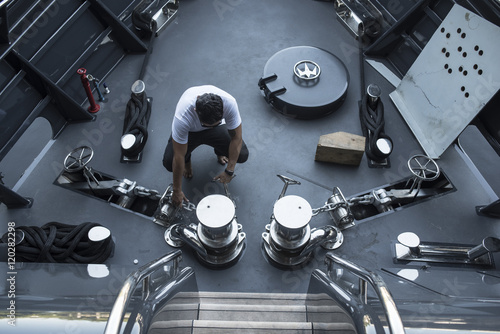 boats designer looking to the yacht in the shipping company