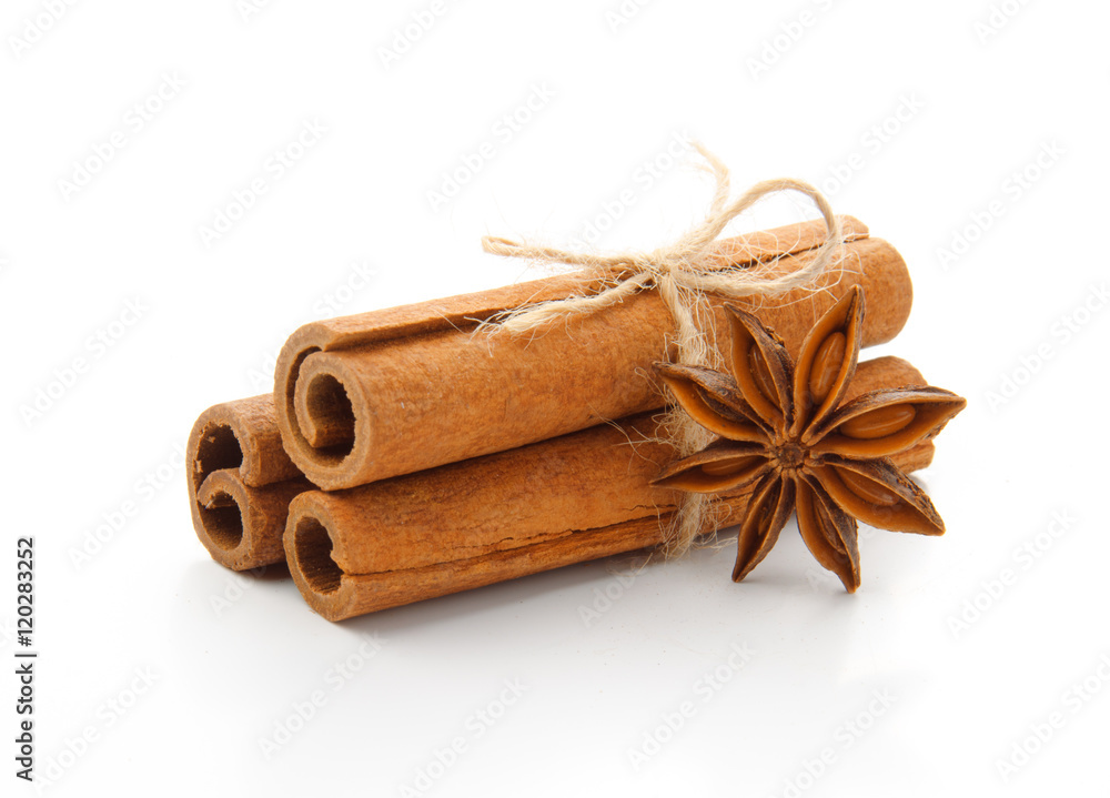 cinnamon stick and star anise spice isolated on white background closeup