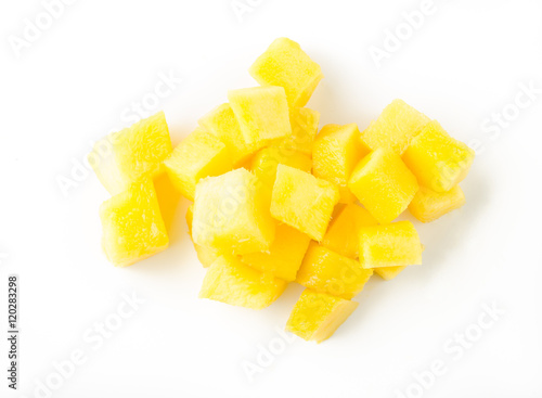 Mango slice cut to cubes isolated on white background