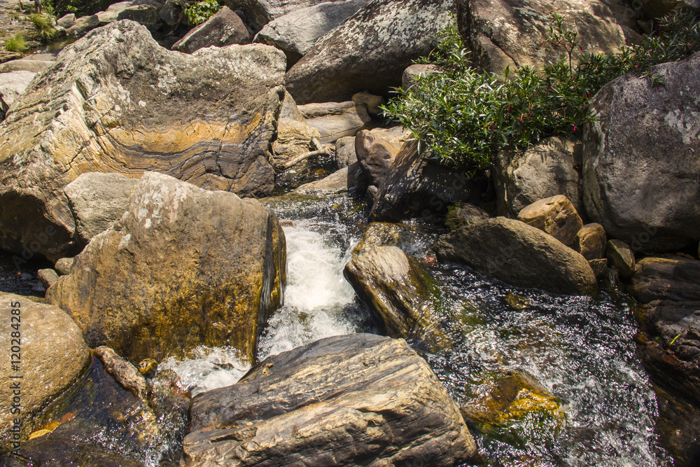 Stones condo, waterfall in sunny day - Serra da Canastra Nationa Stones condo, waterfall in sunny day - Serra da Canastra Nationa