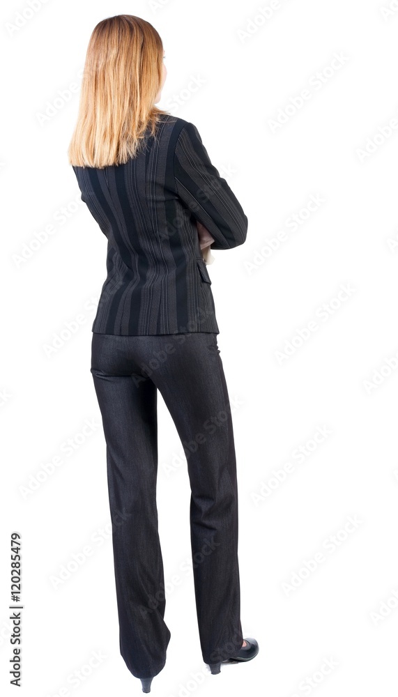 back view of standing beautiful blonde business woman. Young girl in suit. Rear view people collection. backside view of person. Isolated over white background. back view of standing beautiful blonde business woman. Young girl in suit. Rear view people collection. backside view of person. Isolated over white background.
