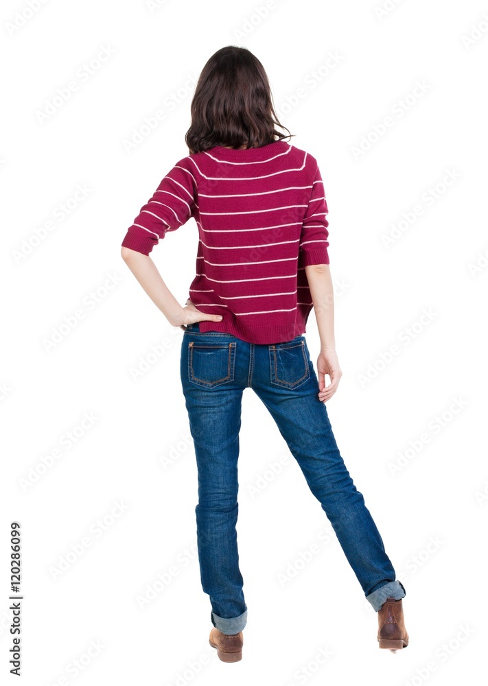 back view of standing young beautiful brunette woman in red pullover. girl watching. Rear view people collection. backside view of person. Isolated over white background. back view of standing young beautiful brunette woman in red pullover. girl watching. Rear view people collection. backside view of person. Isolated over white background.