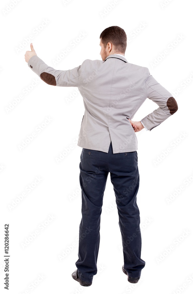 Back view of business man shows thumbs up. Rear view people collection. cheerful office worker shows positive emotions. backside view of person. Isolated over white background. office worker with Back view of business man shows thumbs up. Rear view people collection. cheerful office worker shows positive emotions. backside view of person. Isolated over white background. office worker with