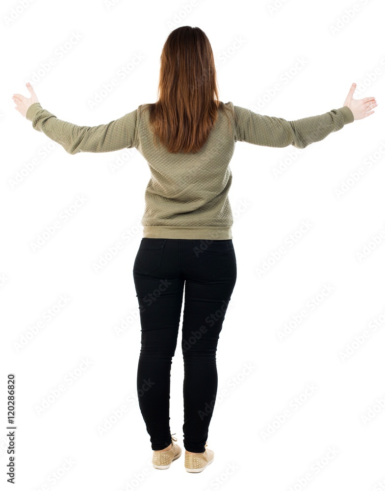 back view of dancing young beautiful woman. girl watching. Rear view people collection. backside view of person. Isolated over white background. A girl in a gray sweater is widely spreading his back view of dancing young beautiful woman. girl watching. Rear view people collection. backside view of person. Isolated over white background. A girl in a gray sweater is widely spreading his