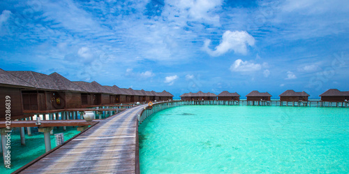 beach with water bungalows at Maldives © Pakhnyushchyy
