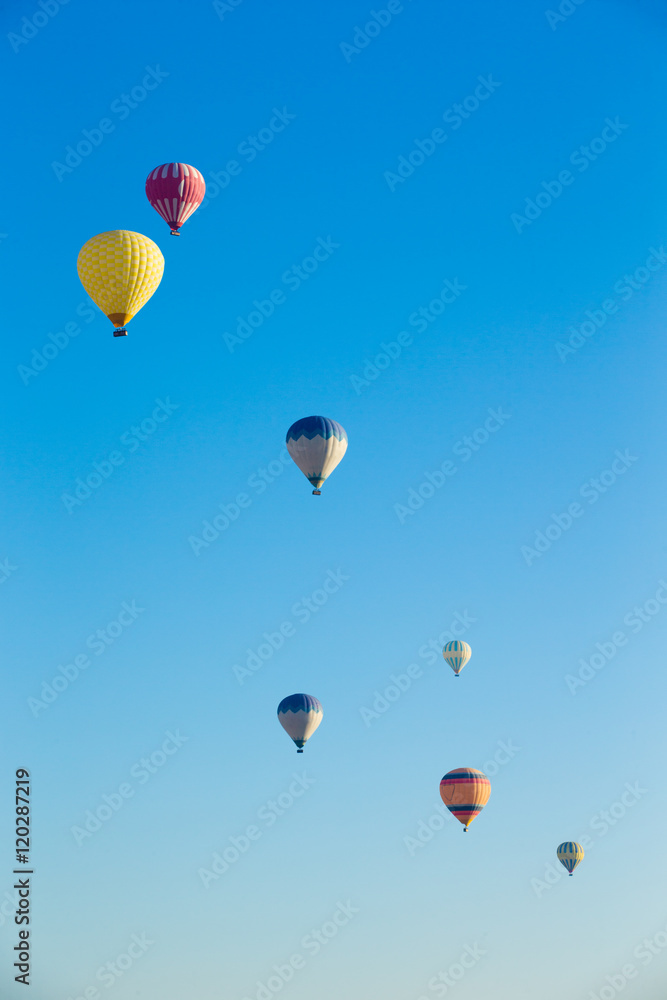 air balloons flying over the valley at Cappadocia air balloons flying over the valley at Cappadocia