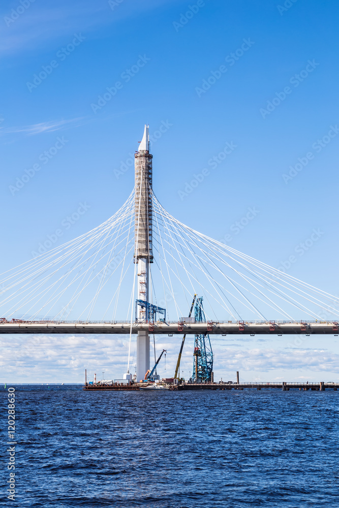 Construction of Cable-stayed bridge over Petrovsky waterway across river Neva as part of the Western High Speed Diameter in St. Petersburg Construction of Cable-stayed bridge over Petrovsky waterway across river Neva as part of the Western High Speed Diameter in St. Petersburg