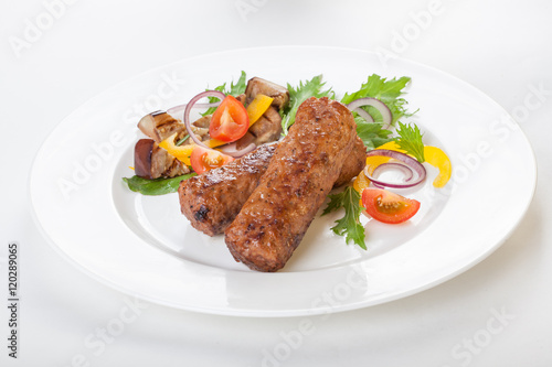 lula kebab with vegetables fresh white background isolated Beautiful