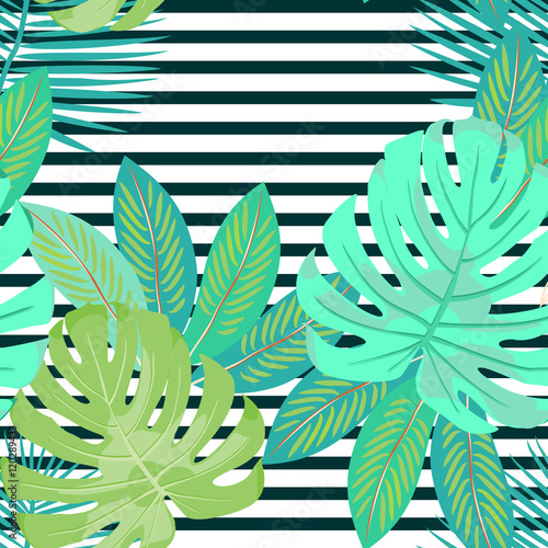 Exotical tropical seamless pattern with palm leaves. Vector.