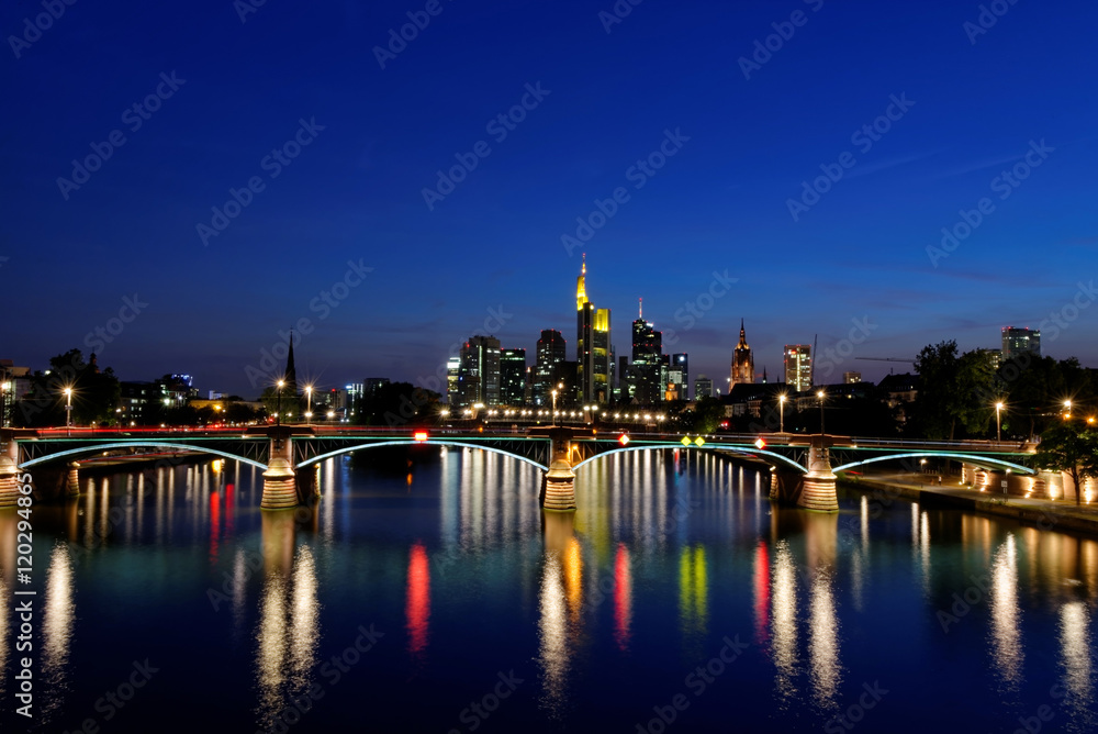 View of Frankfurt am Main skyline at sunset in Germany.