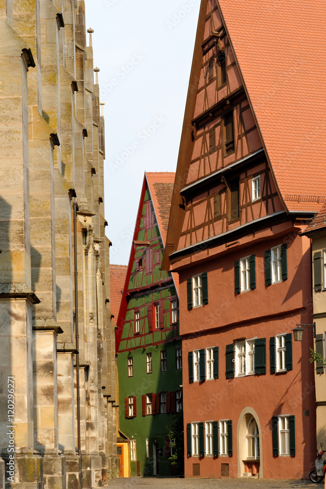 Traditional architecture in the old town of Dinkelsbuhl at sunset. It is one of the best-preserved medieval towns in Europe, part of the famous Romantic Road.