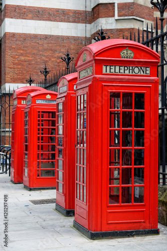 Row of iconic London red phone cabins.