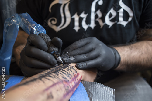 Man getting tattooed