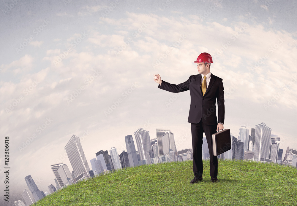 man standing in front of city landscape man standing in front of city landscape