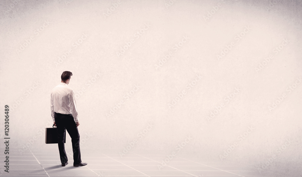 Business person standing in empty space Business person standing in empty space