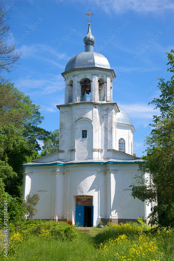 Bell tower of the Assumption church on a sunny june day. Village Korostyn of Novgorod region, Russia