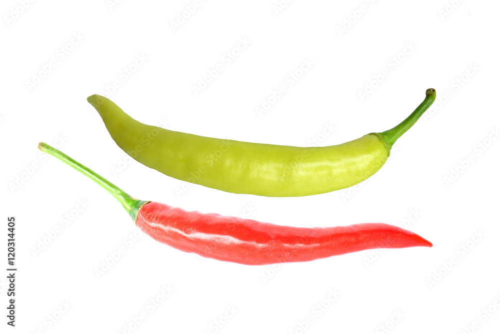 Red and green peppers on a white background.