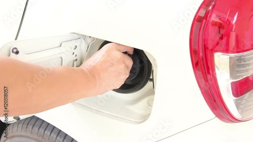 Asian Mans Hand Closing Car Gas Door And Cap Footage