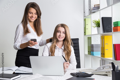 Two trainees at first workplace