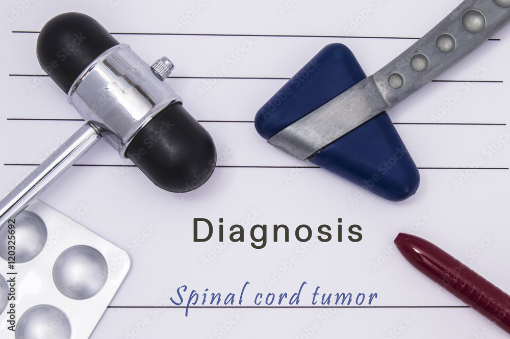 Printed medical form with text diagnosis Spinal cord tumor, two medical