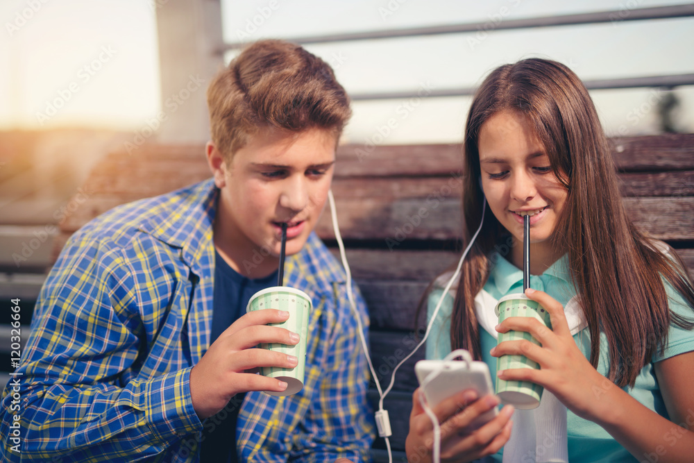 Two Best Friends Girl And Boy Sitting On The Bench Outdoor Li Stock Photo Adobe Stock Two Best Friends Girl And Boy Sitting On The Bench Outdoor Li Stock Photo Adobe Stock