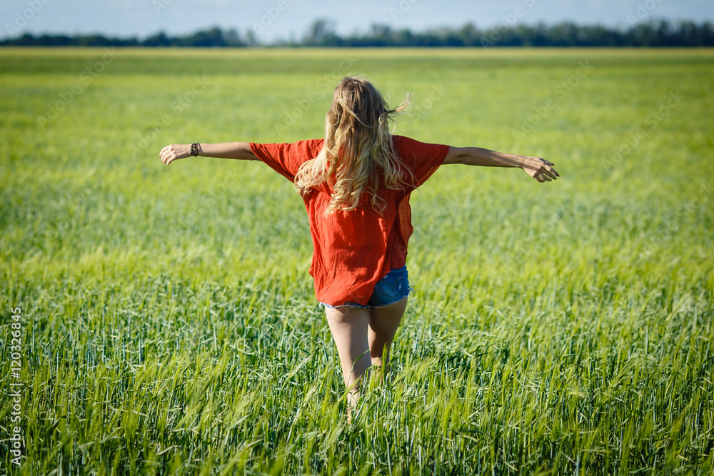 Free happy woman enjoying nature beautiful blonde girl over sky and field outdoor. Freedom concept. Free happy woman enjoying nature beautiful blonde girl over sky and field outdoor. Freedom concept.