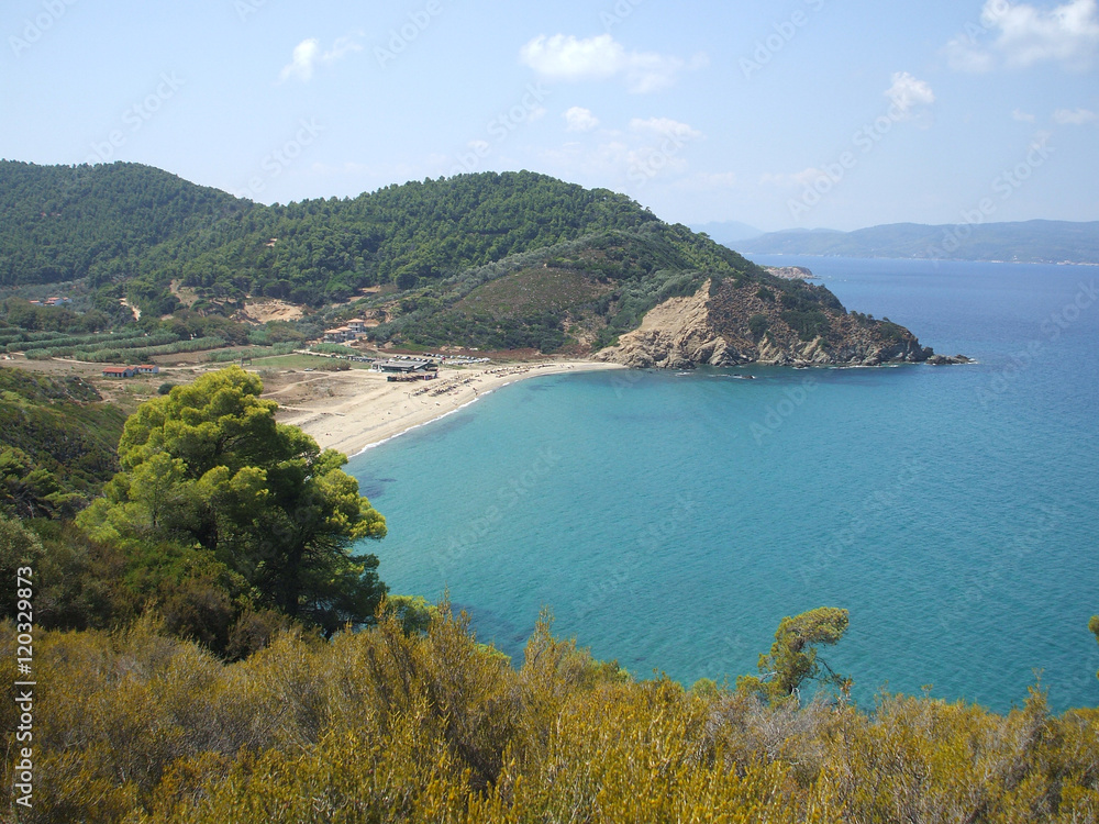 Wide beach between the mountains to the sea at Skopelos island in Greece