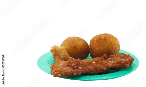 Brown Fried Bananas and deep-fried sweet potato balls on dish photo