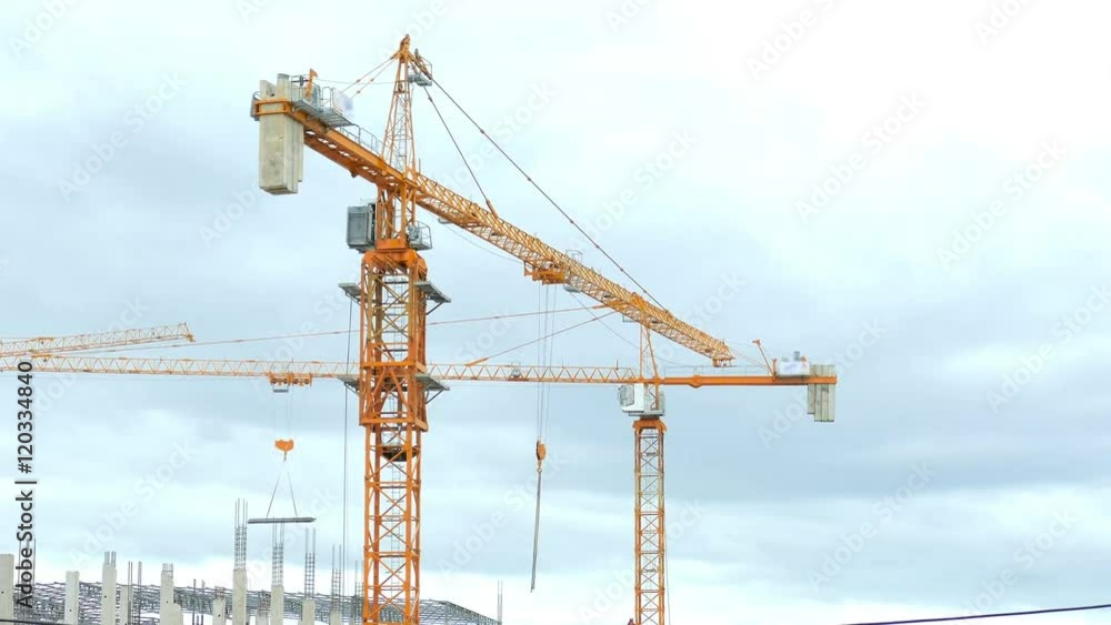 Tower cranes are working Tower cranes are working