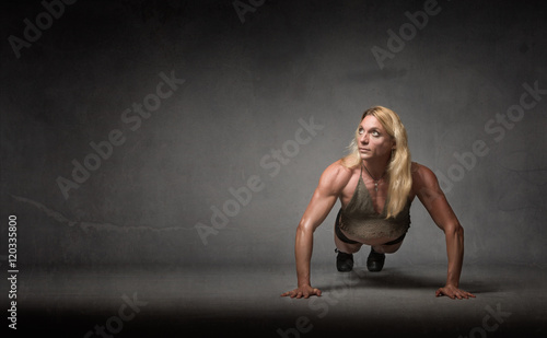 Fototapeta Naklejka Na Ścianę i Meble -  push up for athletic woman