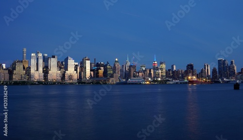 The Manhattan, New York skyline seen at night from Edgewater, New Jersey © eqroy