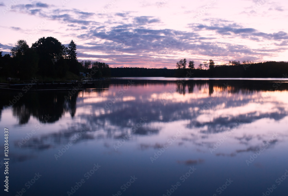Morning landscape wih clouds reflecting in water surface shot at the Seliger lake in Russia Morning landscape wih clouds reflecting in water surface shot at the Seliger lake in Russia