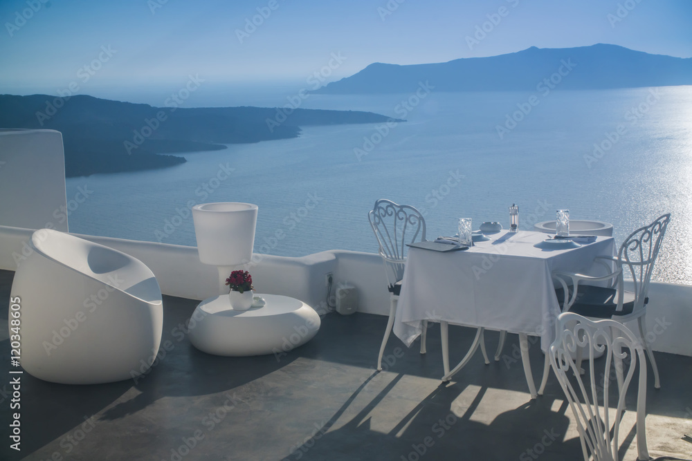 white table in outdoor restaurant in Greece, Santorini