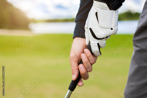 golfer shooting a golf bal