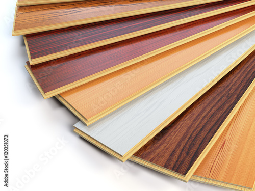 Parquet o laminate wooden planks of the different colors on whit