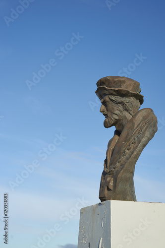 Statue of Ferdinand Magellan over looking the Strait of Magellan in Punta Arenas, Chile. Magellan was the first European to navigate the strait in 1520.