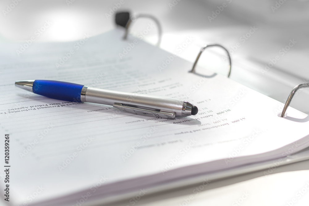 Reviewing documentation in the office. Reviewing documentation in the office.