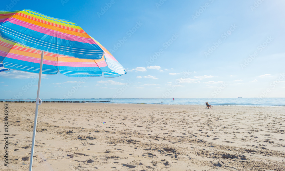 Blue sky over a beach along the sea