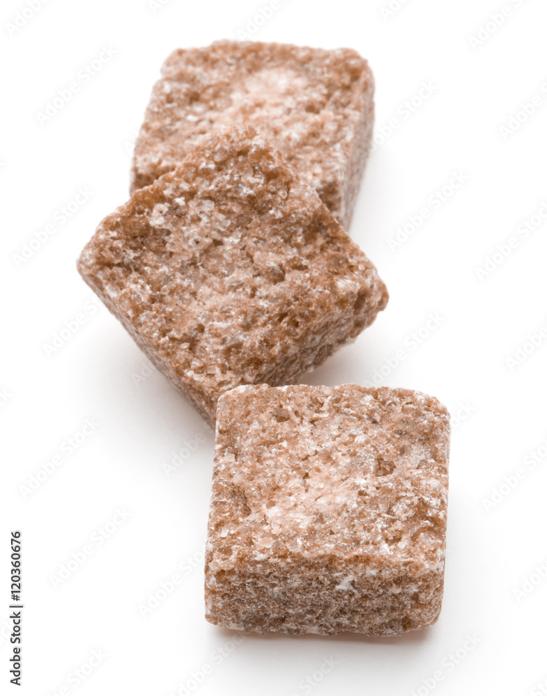 Brown lump cane sugar cube isolated on white background cutout Brown lump cane sugar cube isolated on white background cutout