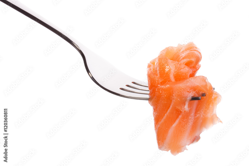 Salmon piece on fork isolated on white background cutout Salmon piece on fork isolated on white background cutout