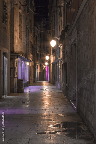 Empty alley in old town Sibenik at night