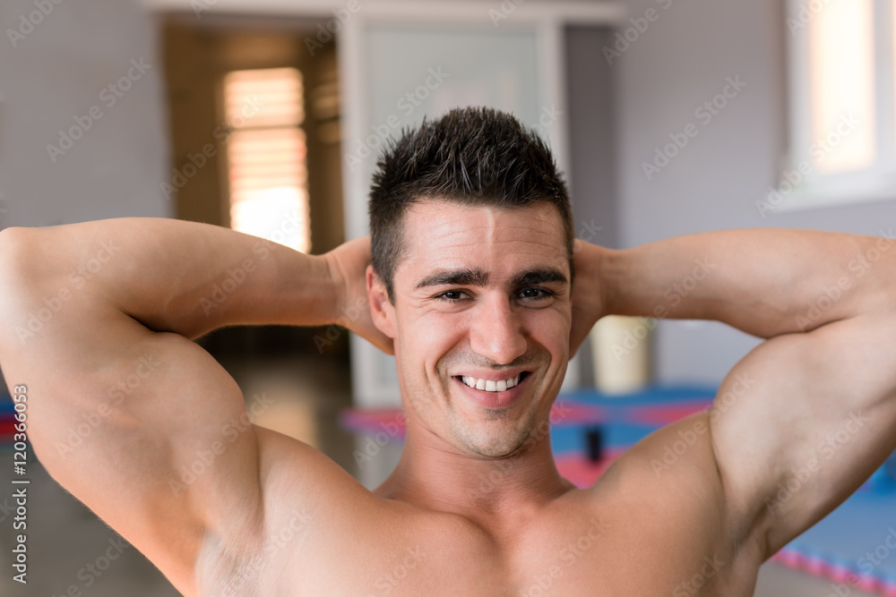 Handsome muscular man in gym Handsome muscular man in gym