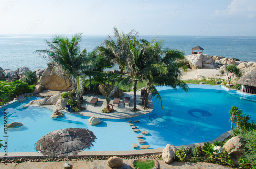 Beautiful tropical swimming pool at Ke Ga beach, Binh Thuan, Vietnam. 