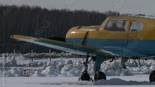 Airplane standing on a runway. photo